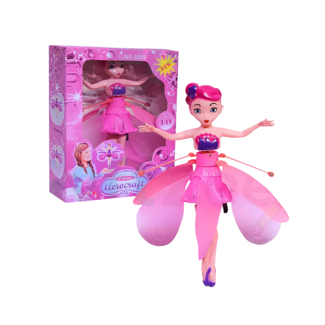 A pink flying fairy doll with hand sensor control, displayed alongside its packaging which shows the doll in flight position.