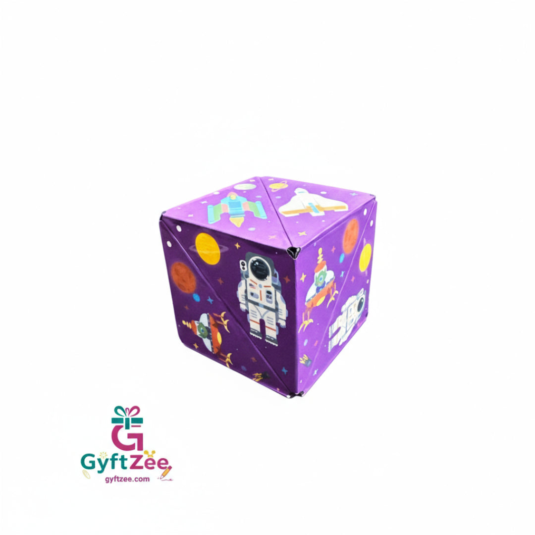 Purple cube-shaped box with space-themed design on a pink background, featuring the GyftZee logo.