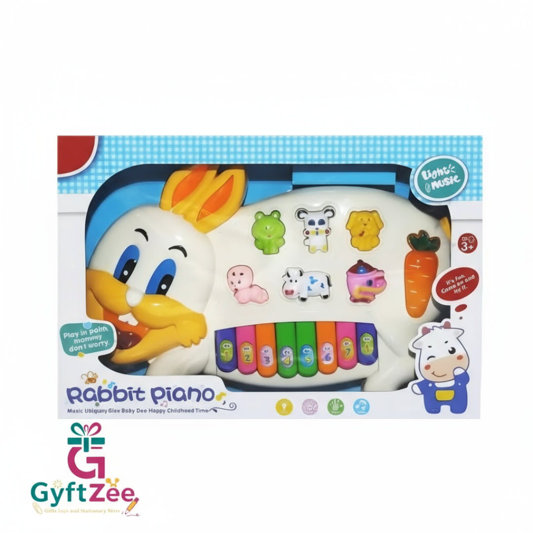 Boxed children's toy piano with cartoon character on a white background