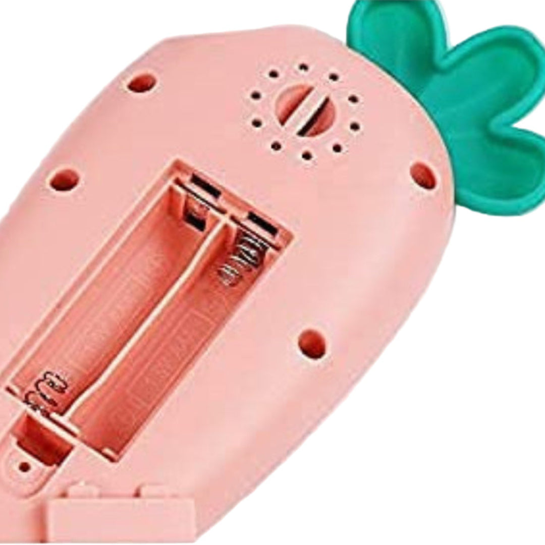 Pink and green toy with a carrot design on a white background