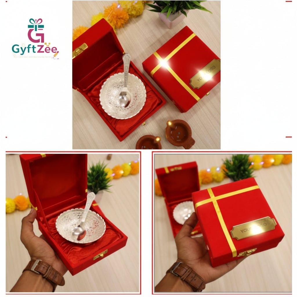 A German silver plated bowl set presented in a red jewellery box with a silver lid, held by a person. The set includes a main bowl and a smaller cup, both with silver plating, and the box is adorned with a yellow ribbon and has 'GYFTZEE' branding.