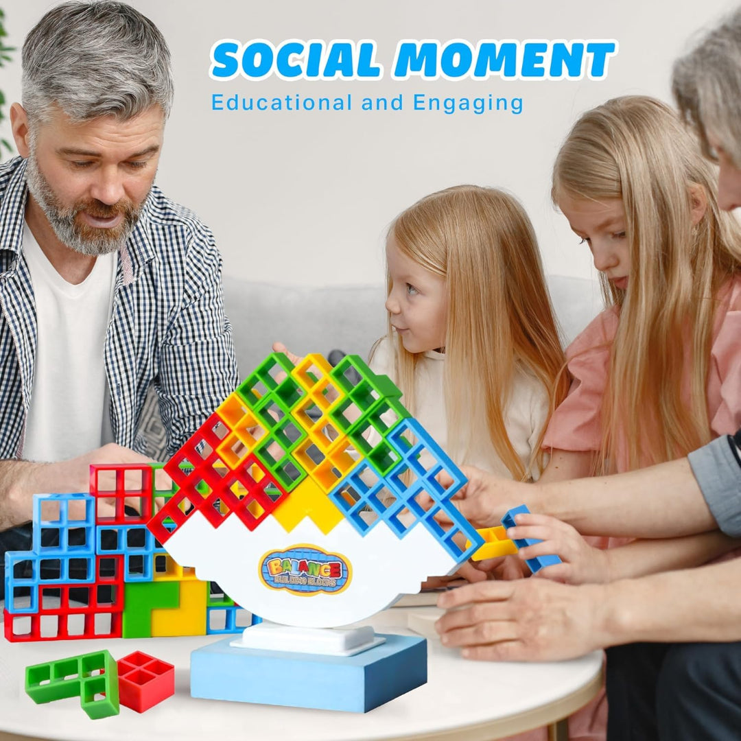 Family playing with educational toy blocks on a table, with 'SOCIAL MOMENT' branding above.