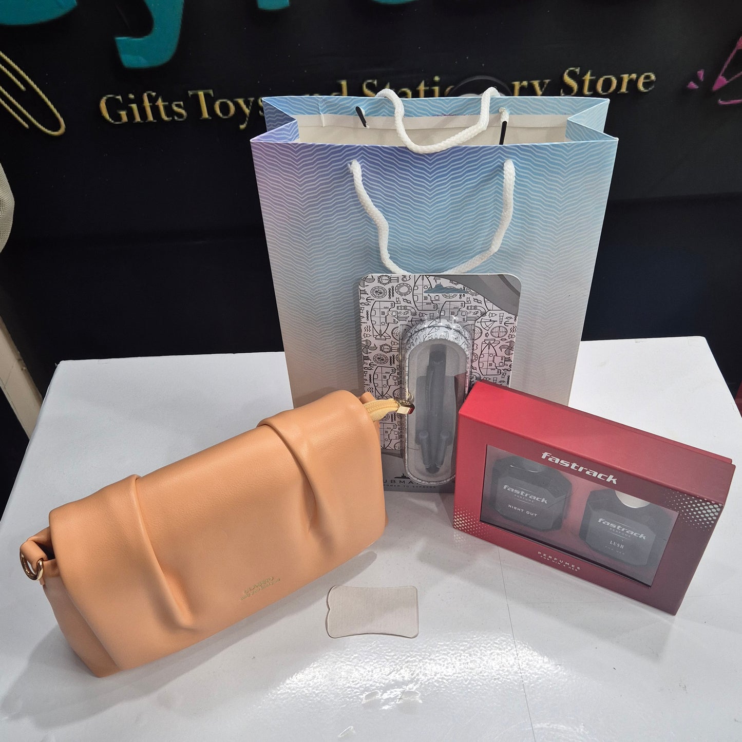 Women's Day Gift Combo ā Fastrack Perfume, Submarine Pen & Trendy PU Purse | Free Gift