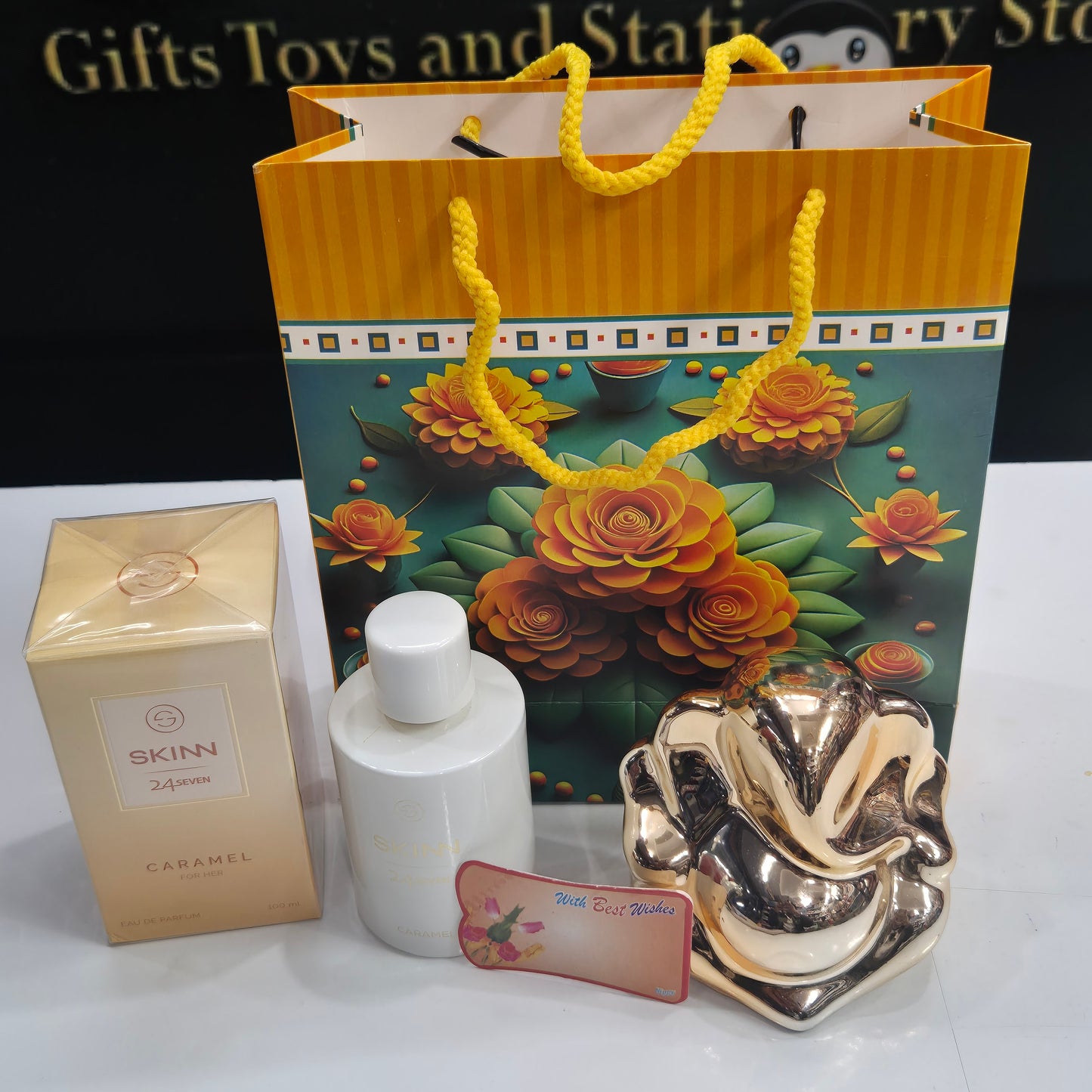 Women's Day Gift Combo – SKINN 24x7 Caramel Perfume & Bronze Ganesha Statue | Free Gift