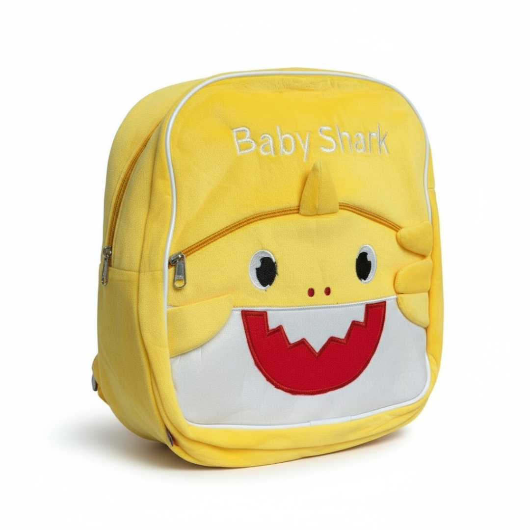 A pink backpack with a Baby Shark character design on the front.