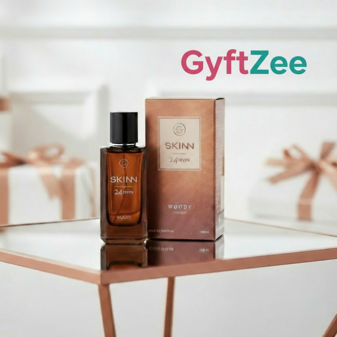 SKINN perfume bottle and box on a reflective surface with 'GyftZee' branding.