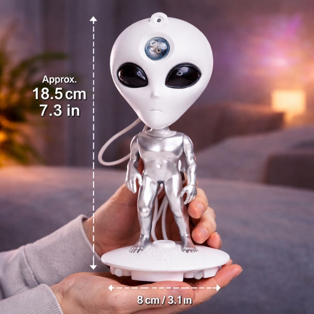 Alien figure held in hand with measurements indicated