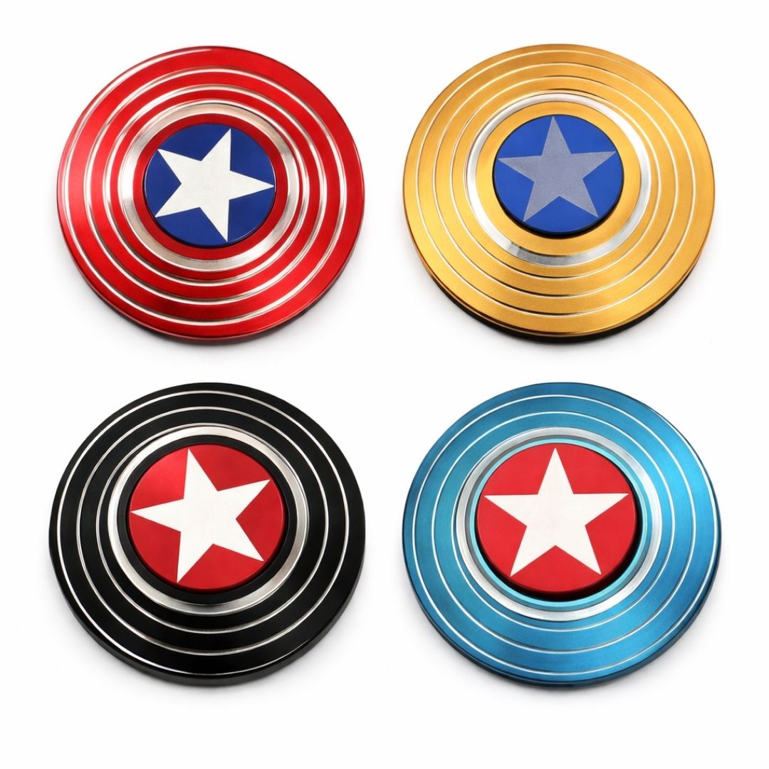 Four fidget spinners with star designs in red, gold, black, and blue on a white background.