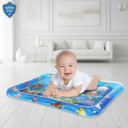 Baby playing on an inflatable water mat with sea creature designs in a room.