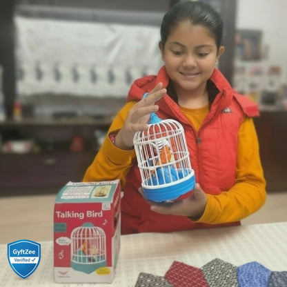 Child holding a toy birdcage with a bird inside, next to the packaging, in a home setting.