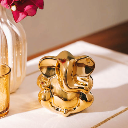 Women's Day Gift Combo – SKINN 24x7 Caramel Perfume & Bronze Ganesha Statue | Free Gift
