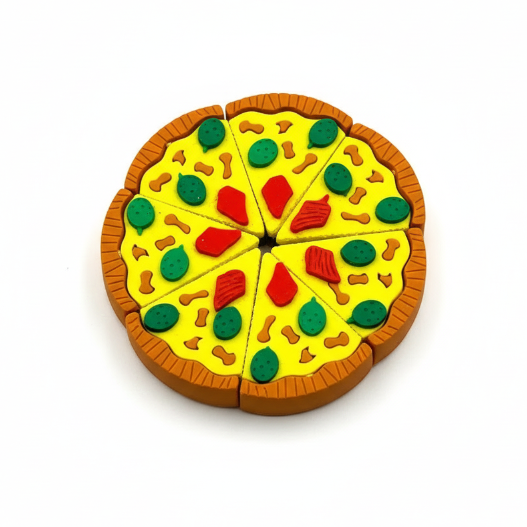 A pizza-shaped rubber eraser with colorful toppings presented in an open red and white box designed to resemble a pizza box.