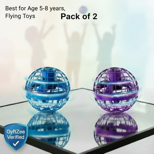 Two flying toys, one blue and one purple, on a reflective surface with a blurred background. Gyrosphere ball toy pack of 2 for twins