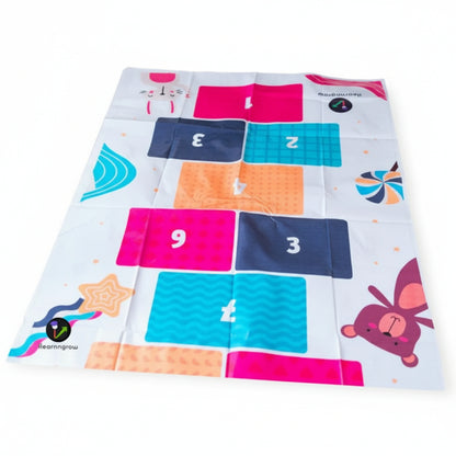 Colorful baby play mat with numbers and shapes on a white background