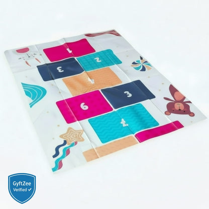 Colorful children's play mat with numbers and shapes on a white background