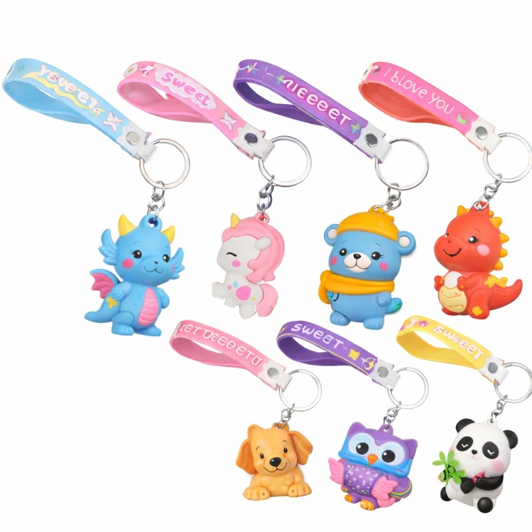 Set of colorful keychains with animal figures on a white background