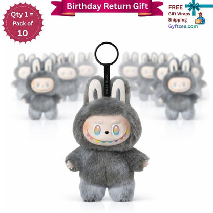 Plush toy with a keychain attachment on a white background, with promotional text overlay.