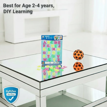 Educational toy set with letters and numbers on a glass table, suitable for ages 2-4.