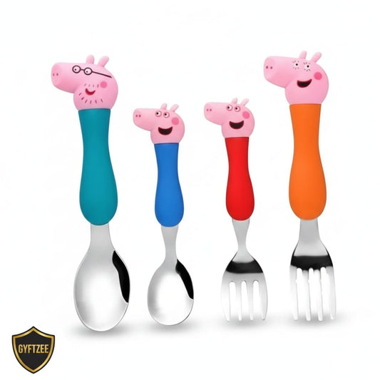 Set of children's cutlery with cartoon pig handles on a white background