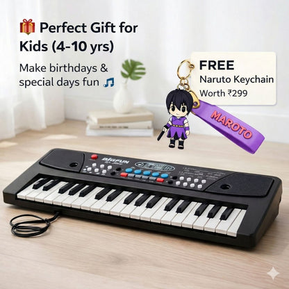Children's keyboard with a free Naruto keychain on a wooden surface