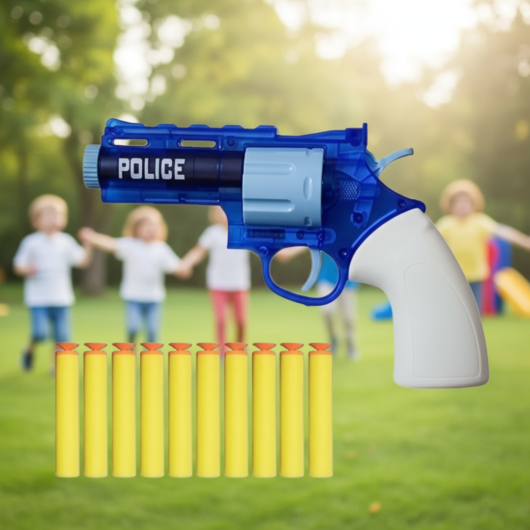 Toy police gun with darts on a grassy background with children playing.