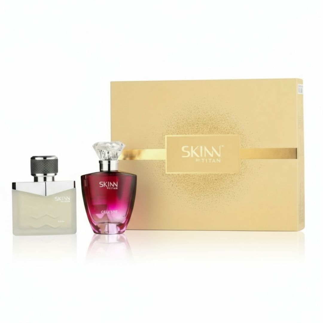 Two Skinn fragrances and a gold box on a white background