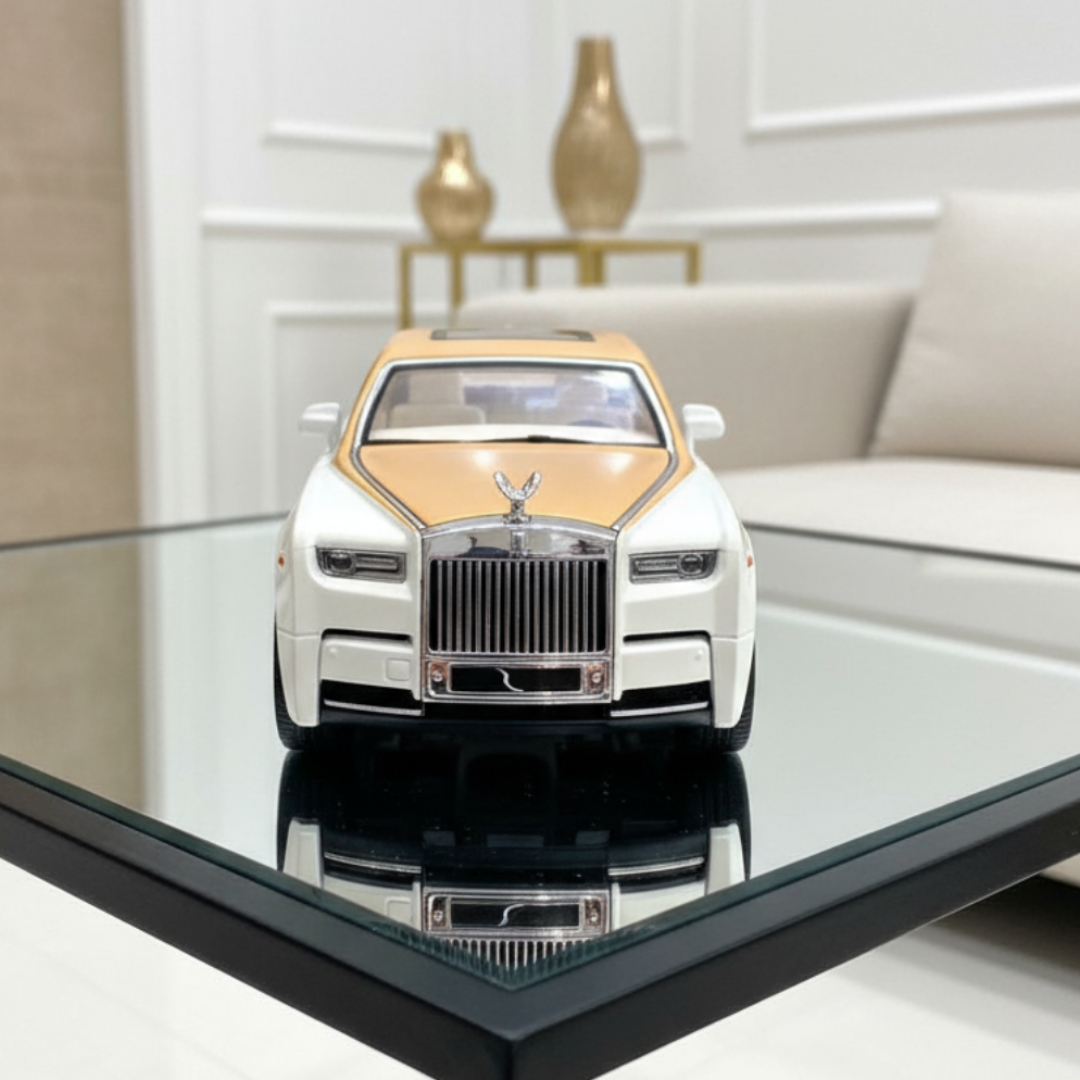 Model of a luxury car on a reflective surface with a blurred indoor background