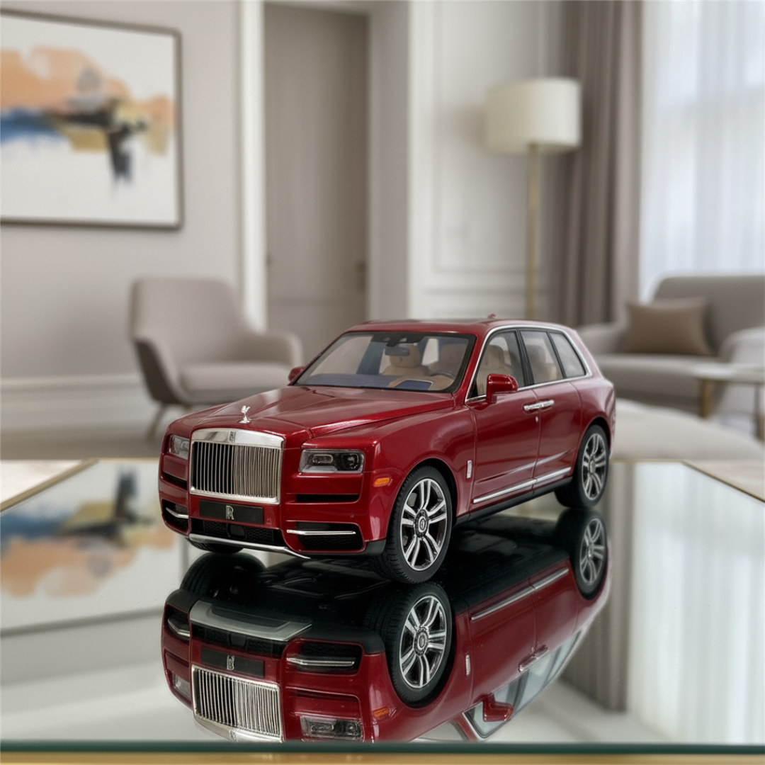 Red luxury car model on a reflective surface in a modern living room.