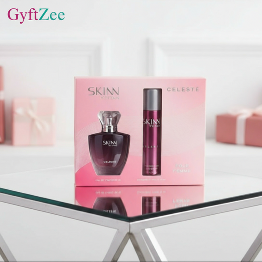 SKINN Celeste perfume set on a glass table with a white background