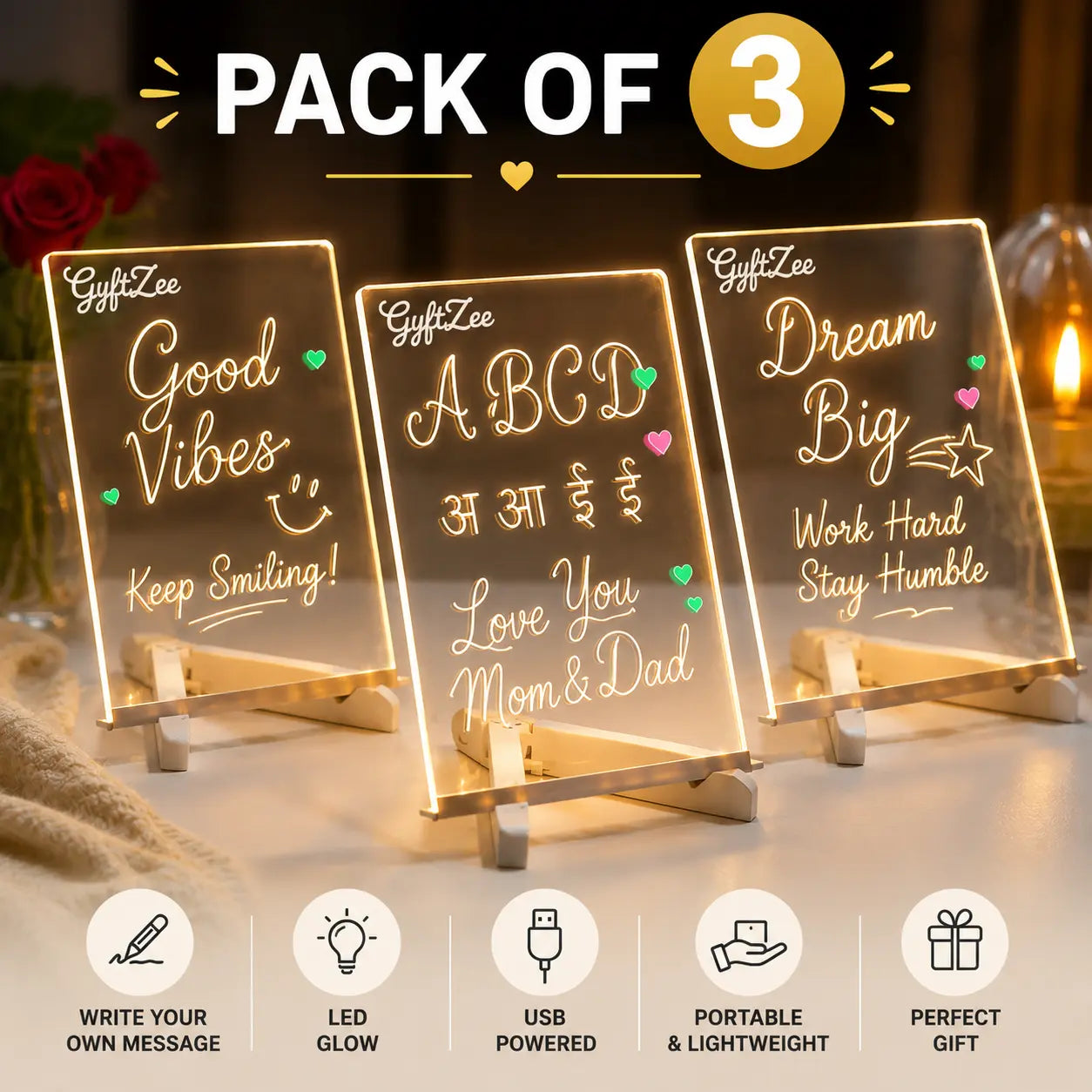 Pack of three LED sign lights with motivational messages on a wooden stand.