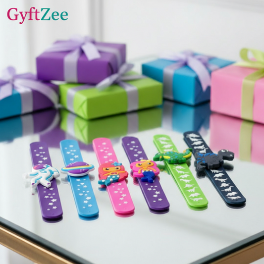 Colorful children's wristbands on a reflective surface with gift boxes in the background.