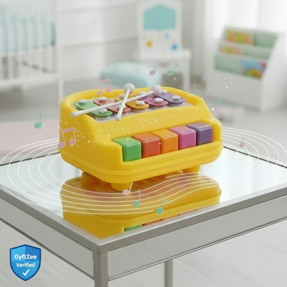 Colorful toy piano on a glass table with a blurred background