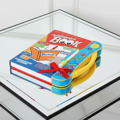 Colorful book-shaped toy with a red ribbon on a glass surface and learning kit for kids